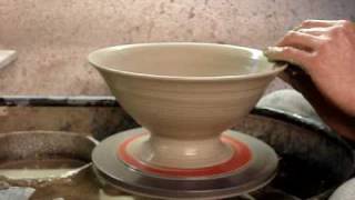 Throwing a clay pottery pasta bowl on a potters wheel demonstration demo how to pot throw make [upl. by Ylrevaw]