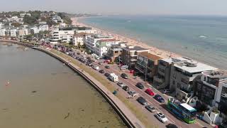 Aerial footage of Sandbanks and Poole Harbour Dorset UK [upl. by Raseta]