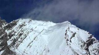 Snow blowing off mountains behind Three Lakes Valley in Kananaskis [upl. by Aroz]