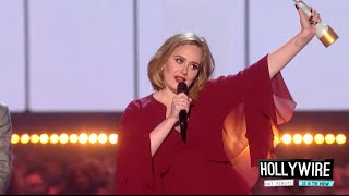 Watch Adele Support Keha During BRIT Awards Speech  Hollywire [upl. by Cj694]