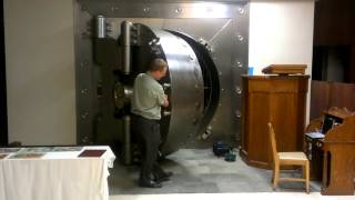 Closing a round bank vault door [upl. by Maureen]