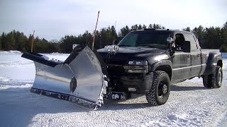 Snow Plowing Silverado 3500 with Snowdogg V Plow Pushing Snow [upl. by Nevaed]