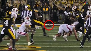 Iowa player kicks ball to himself on wild INT vs Wisconsin [upl. by Wendel]