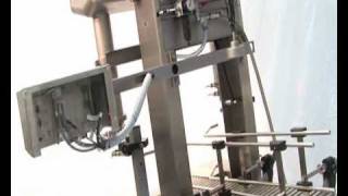 Serac  Semiautomated filling and capping machine [upl. by Dlorrej]