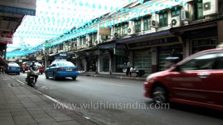 Traffic moves along a busy road in Bangkok [upl. by Ewald]