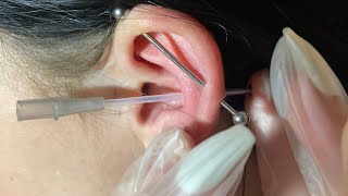 close up conch piercing at home [upl. by Nosrac]