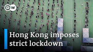 Hong Kong locks down to curb record COVID infections  DW News [upl. by Kcaj]