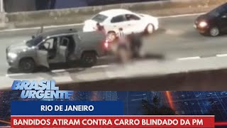 Bandidos atiram contra carro blindado da PM  Brasil Urgente [upl. by Merrielle]