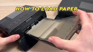 Canon Selphy CP1300 amp CP1500 How to Load Paper [upl. by Ynaffyt]