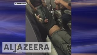 Outrage as Asian man dragged off United Airlines flight [upl. by Ru]