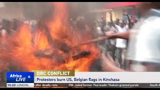 DR Congo protesters burn US and Belgian flags in Kinshasa [upl. by Yorled]