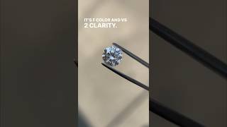 Setting a diamond into an engagement ring [upl. by Shawn]