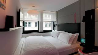 Inside citizenM Paris ChampsElysees hotel guest room [upl. by Acinomal]