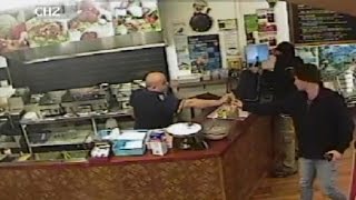 Watch Store Clerk Completely Ignore An Armed Robber To Help Customers [upl. by Nylrebmik]