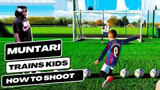 Sulley Muntari trains children how to shoot and score great goals [upl. by Ecinerev704]