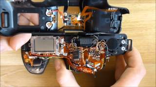 The teardown of the Minolta Dynax 3000i begins [upl. by Nahgaem]