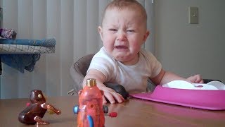 Baby is freaked out by monkey toy  Babies and Toddlers  KYOOT [upl. by Doug]