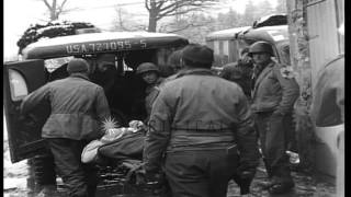 German Oberstleutnant Baron Friedrich August von der Heydte placed in US ambulaHD Stock Footage [upl. by Aihcats893]