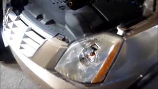 How to Replace and Change a Headlight Bulb in a Cadillac DTS [upl. by Anival540]