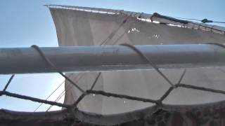 Sailing on the Nile with a felucca Egyptian sailboat in Aswan Egypt [upl. by Atinar]