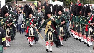 Huntly and District Pipe Band marching to the 2022 Braemar Gathering in Royal Deeside Scotland [upl. by Ataynek]