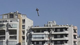 Images from Lebanon show Israeli bomb approaching a building and exploding [upl. by Latrina806]