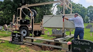 Setting a Concrete Grave Liner with a Johnny Handler [upl. by Thenna410]