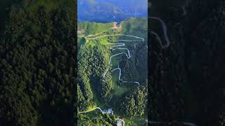 winding road on mountain top in china空中俯瞰蜿蜒而上的公路很像一个亮字而得名Amazing cliff landscapes in China [upl. by Bartolome]