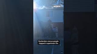 Bystanders rescue people trapped in apartment fire shorts [upl. by Kerat]