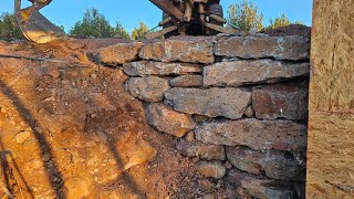 Building a rock retaining wall for our offgrid home [upl. by Yme140]