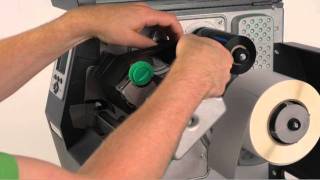 Installing the Ribbon and Media on a DatamaxONeil HClass Barcode Label Printer [upl. by Atirys]