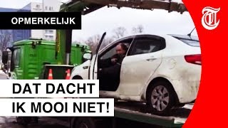 Heetgebakerde Rus laat auto niet wegslepen [upl. by Ynahirb924]