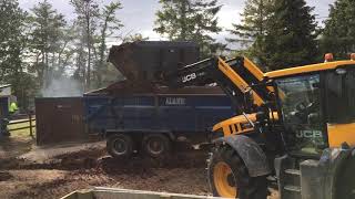 JCB fastrac 4190 mucking out horses [upl. by Ahsatal]