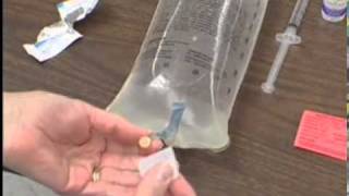 IV Therapy Adding Medication to IV Solution Bag [upl. by Ariat61]