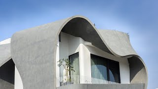 Studio Ardete ‘dresses’ Ribbon House with undulating concrete [upl. by Ataliah]