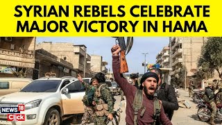 Syria War Today  Syrian Rebels Celebrate Capturing Hama After Military Withdraws  News18  N18G [upl. by Elatnahs]