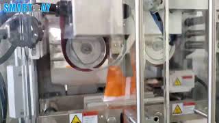 Volumetric dosing cup packing machine for snack [upl. by Ivatts857]