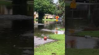 Locals Use Kayaks to Traverse Flooded Roads in Sarasota [upl. by Kcirdef]