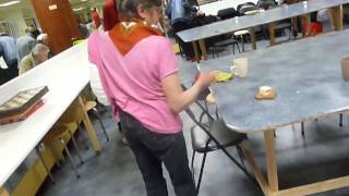 One armed woman washes tables stacks chairs at Christadelphian soup kitchen after church [upl. by Cassaundra]