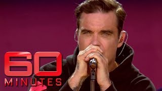 Robbie Williams emotional response to Manchester tribute  60 Minutes Australia [upl. by Ayocat]