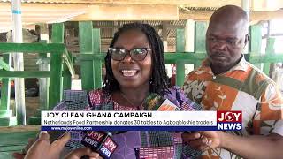 Joy Clean Ghana Campaign Netherlands Food Partnership donates 30 tables to Agbogbloshie traders [upl. by Sybyl544]