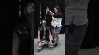 A Canadian women shoves a sword down Auzzys THROAT at the Winnipeg tattoo show [upl. by Ecirrehs]