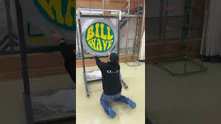 Man is tufting a custom rug with the logo for Bill Wave [upl. by Anua]