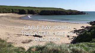 Cable bay sandy beach Porth Trecastell Isle of Anglesey is on the Anglesey Coastal Path [upl. by Josh435]