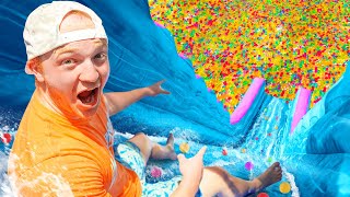 BIGGEST Backyard Water Slide With 100 MILLION ORBEEZ [upl. by Terina]