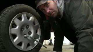 How To Change a Flat Tire Using The Tools In Your Car  EricTheCarGuy [upl. by Nomaj646]