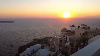 GW  Oia Stunning sunset views of caldera balcony of Aegean in Santorini  4K [upl. by Asselim585]