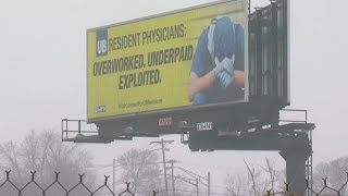 Billboards claim UB resident physicians are Overworked Underpaid Exploited [upl. by Yardley]