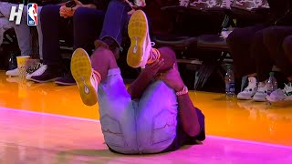 This Lakers Fan injured himself on the halfcourt shot 😳 [upl. by Okiam3]