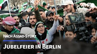 Tausende Syrer feiern Sturz von Assad in Berlin  AFP [upl. by Ymma423]